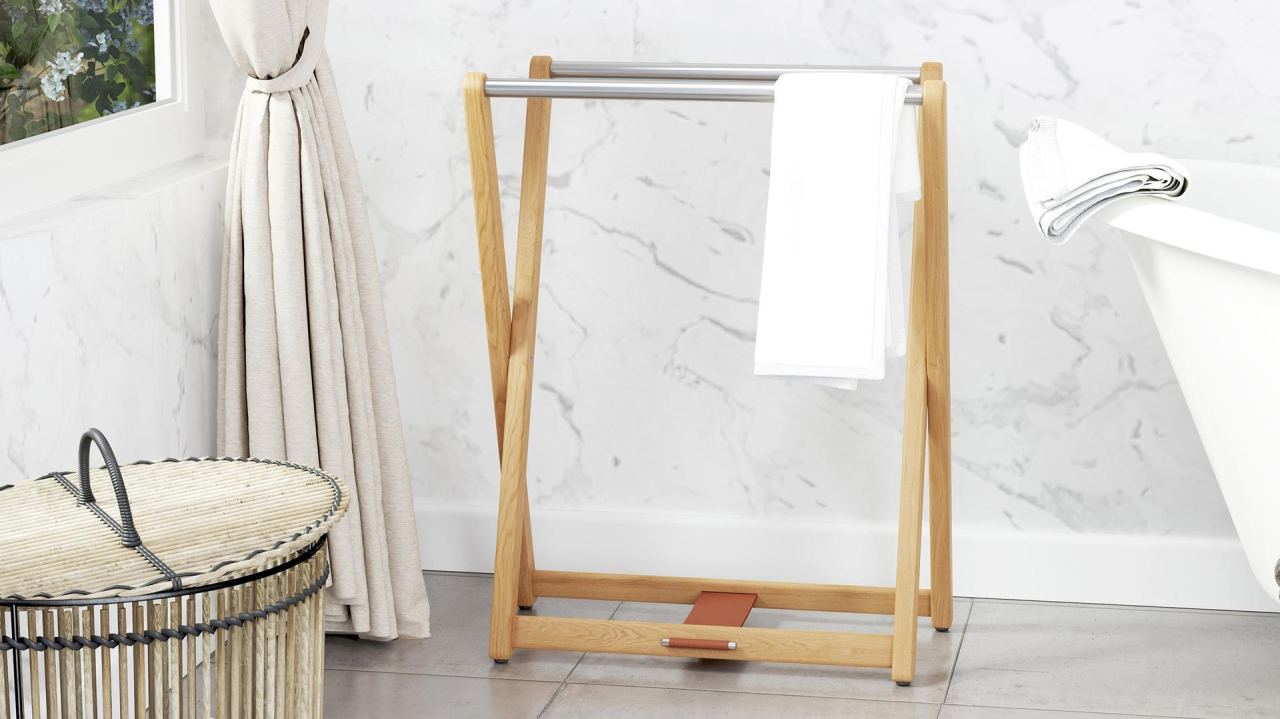 Nara towel stand Malaysia placed next to a modern bathtub